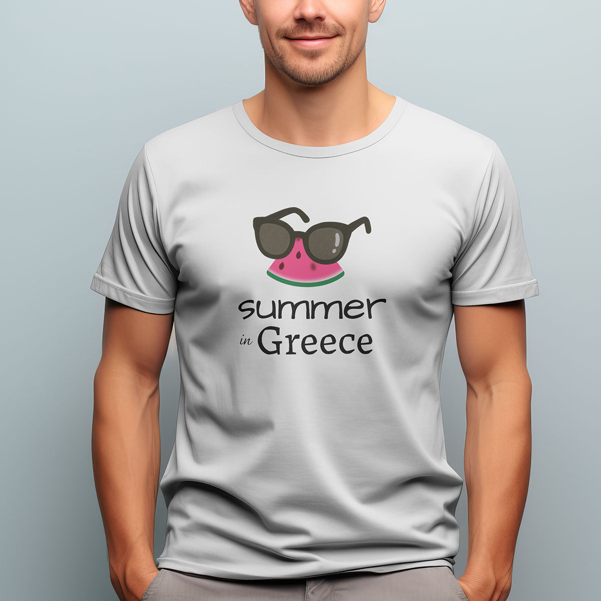 Person wearing a 'Summer in Greece' t-shirt with sunglasses and watermelon design on the front.